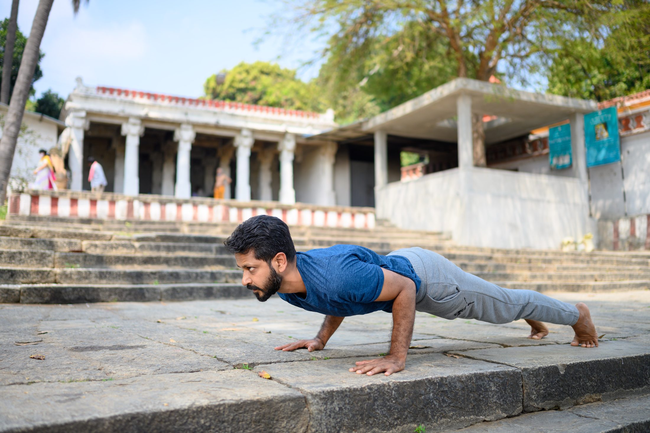 Ankur Bhati practising Chaturanga in a temple courtyard